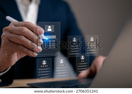 Businessman using digital interface to evaluate candidate profiles with rating and checklist, representing modern recruitment, HR technology, employee selection and data driven hiring.