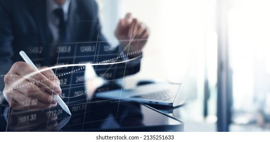 Businessman using digital tablet analyzing sales data and market growth, financial graph chart on virtual screen. Business strategy, finance and investment concept, business and technology background - Shutterstock ID 2135251633