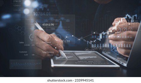 Businessman using digital tablet analyzing sales data and financial growth graph chart report. Business planning, strategy and development. Financial and banking. market research, data analysis