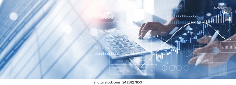 Businessman using digital tablet analyzing sales data and financial growth graph chart report. Business planning, strategy and development. Financial and banking. market research, business analysis - Powered by Shutterstock