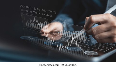 Businessman using digital tablet analyzing sales data and financial growth graph chart report. Business planning, strategy and development. Financial accounting. market research, data analysis