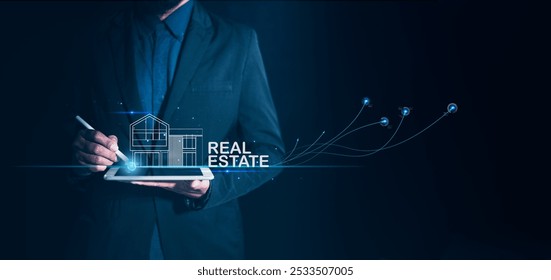 A businessman using a digital tablet to manage real estate, with a holographic house representation, set against a dark background. - Powered by Shutterstock