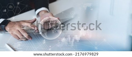 Businessman using digital tablet on global network connection, data exchange, business development, metaverse. Internet technology, digital marketing. Financial, banking, investment, global business