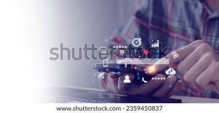 Businessman using digital tablet to use marketing tools and check pay per click web page traffic research program for online business and..