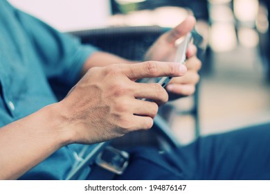 Businessman using digital tablet,hand touching screen on digital tablet - Shutterstock ID 194876147