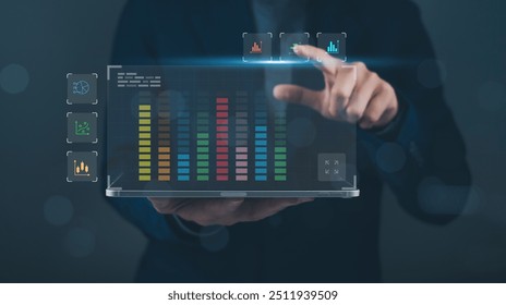 Businessman using futuristic digital interface with data visualization charts. Concept of technology, innovation, and business analytics.