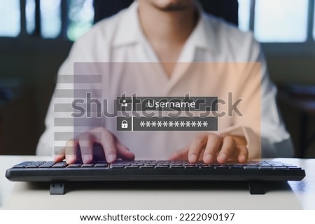 Businessman using keyboard access window with login and user password on virtual screen. Cyber security and personal data protection,safety network online, safe system computer concept.