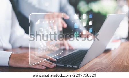 Businessman using laptop to access documents online,Document Management System,Manage financial and marketing documents Annual budget account updates company growth information,