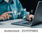 Businessman using laptop with advertising on website for planning advertising marketing strategies to target social media native, ad, advertisers, sales. 