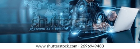 A businessman using a laptop with analysis data of Platform as a Service (PaaS) shows the global network market growing rapidly, driven by digital transformation, cloud adoption, and AI integration.