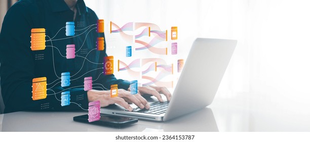 Businessman using a laptop with Analytics and Data Management Systems  Analyst working in Business Analytics and Data Management Systems to make reports and corporate strategy for finance, operations