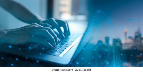 Businessman using laptop analyzing business data and financial report, economic growth graph chart. Business planning and strategy. Analysing trading of exchange. Financial and banking.