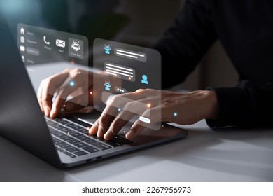 Businessman using laptop computer chatting with chat bot,  Chat with AI or Artificial Intelligence technology. chatting communication.