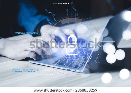 Businessman using laptop computer with digital padlock, cybersecurity concept, user privacy security and encryption, secure internet access Future technology and cybernetics, screen padlock.