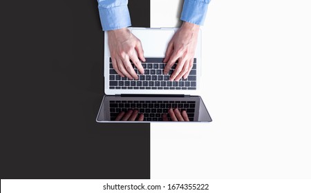 Businessman Using A Laptop Computer Overhead View