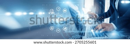 Businessman using laptop and e-learning analyzing technological data, virtual classrooms, learning management systems, interactive content, remote education, knowledge sharing platforms.
