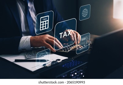 Businessman Using The Laptop To Fill In The Income  Tax Online Return Form For Payment. Financial Research,government Taxes And Calculation Tax Return Concept. Tax Time