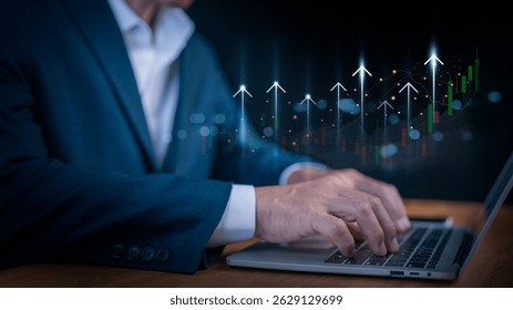 Businessman using laptop with financial growth chart and upward arrows, stock market investment concept, economic development, business analytics, financial success strategy background