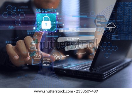Businessman using the laptop in office and screen appears to enter the username and password to login to the system. Cyber security for data information technology ISO IEC 27001 and 27002 concept.
