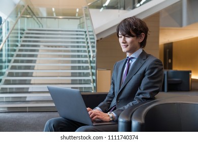 Businessman Using Laptop Pc.