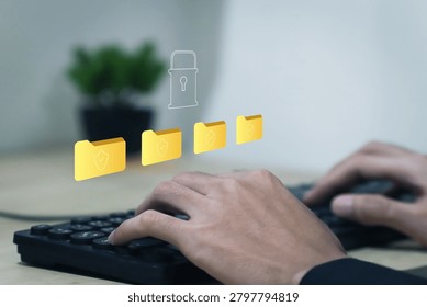 Businessman using laptop with secure data protection system and encrypted digital folders for cybersecurity, privacy management, cloud storage security and information safety.