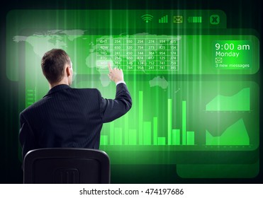 Businessman using media interface