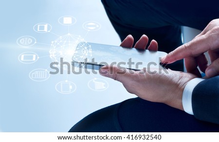 Businessman using mobile payments, holding circle global and icon customer network connection, Omni Channel 