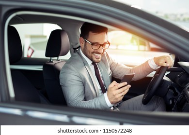 Businessman using mobile phone - Powered by Shutterstock