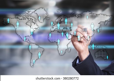 businessman using  modern computer and drawing world map with people icons  on the virtual screen. business, internet and. tehnology concept. 