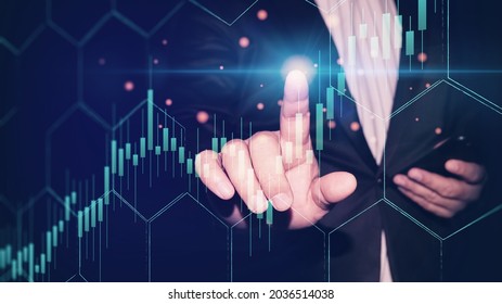 Businessman using modern computer technology and digital tablet analyzing sales data and economic growth, financial graph chart. Business strategy analysis - Shutterstock ID 2036514038