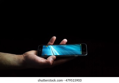 Businessman Using Modern Mobile Phone On Black Background