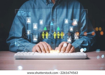 Businessman using multi level diagram on virtual screen, human resource, network marketing or multi level marketing business concept ,Hierarchy chart