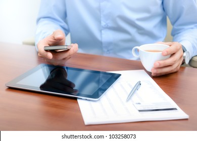 Businessman using new technologies for success workflow.
