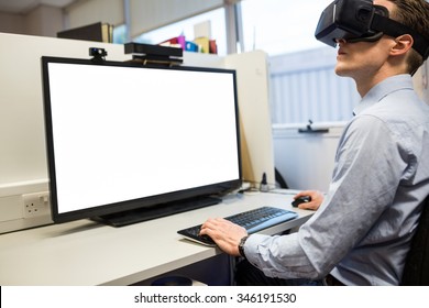 Businessman using oculus rift headset in the office