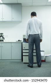 Businessman Using Photocopier