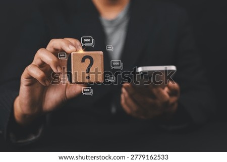 Businessman using question mark speech bubbles, representing QandA communication, fast online support, FAQ services, and instant customer assistance.
