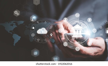 Businessman using smartphone to access with internet banking for payment , online shopping and digital technology business.