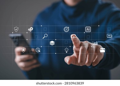 Businessman using smartphone with cloud computing, AI automation and digital management interface. Modern business technology concept for data analytics, cybersecurity and smart workflow system.