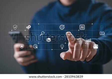Businessman using smartphone with cloud computing, AI automation and digital management interface. Modern business technology concept for data analytics, cybersecurity and smart workflow system.