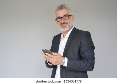 Businessman Using Smartphone, Isolated On Grey Background 