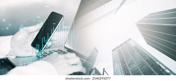 Businessman using smartphone and laptop with digital financial charts overlay, cityscape background, concept of trading and investing - Powered by Shutterstock