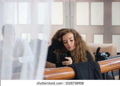 Businessman Using A Smartphone, Not Interested.