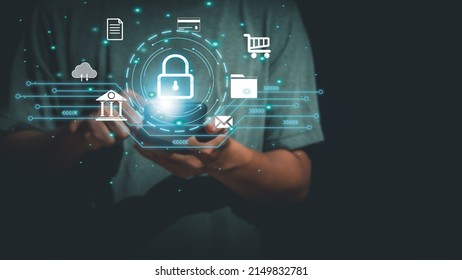 Businessman Is Using Smartphone To Protect Personal Information, Virtual Lock Screen Icon Is Available On Online Network, Financial Security, Marketing And Internet Traffic Concept.