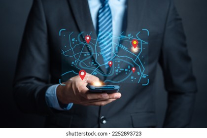 Businessman using smartphone searching world map with location point, GPS app, Destination travel maps and find places in the online system, searching by satellite system.