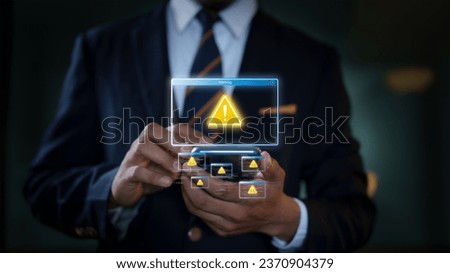 Businessman using a smartphone with a sign warning of online crime risks. Accessing websites, clicking on unsafe text links is a threat to identity theft software.