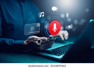 Businessman using smartphone touch microphone button on virtual screen. Blog blog speak talk advertising presentation,Voice recognition, speech detection and deep learning application,Voice Assistance - Powered by Shutterstock