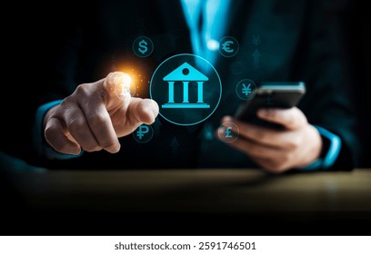 Businessman using smartphone and touching virtual banking icon with global currency symbols, representing digital banking, financial transactions, fintech, global economy, and online payment solutions