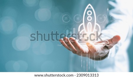 Businessman using a smartphone, with virtual rising rocket icons, Concept of reaching business goals achieved through effective business strategies, statistical analysis, and solution management