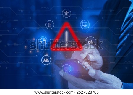Businessman using smartphone with warning triangle. Warning of dangerous problems Server error. Virus. Maintenance concept. Warning or alert, technology scam, tech crime Concept