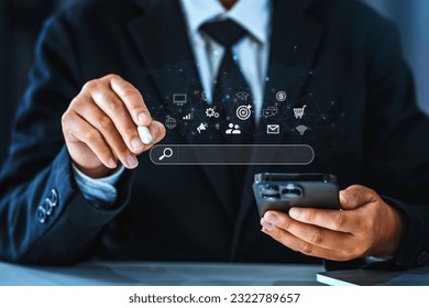 Businessman using a Smathphone for analysis SEO Search Engine Optimization Marketing Ranking Traffic Website Internet Business Technology Concept.